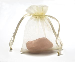 White, yellow and pink quartz are among the most powerful of crystals.  Carry Mindful Presents yellow quartz in your purse. Slip it into your glove compartment. 