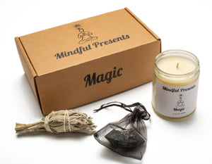 Our Magic Box comes with a Mindful Presents Magic candle, sage, and a black tourmaline crystal. 